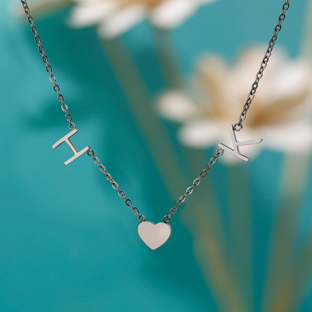 Collier 2 initiales personnalisées et petit coeur