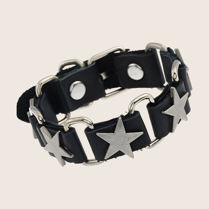 Bracelet a motif etoiles argentees, fermoir ardillon, finition punk, modele Seren — photo 1