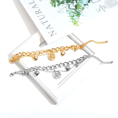 Bracelet femme en acier inoxydable avec cœurs et arbre de vie, modèle Kathy, or et argent.