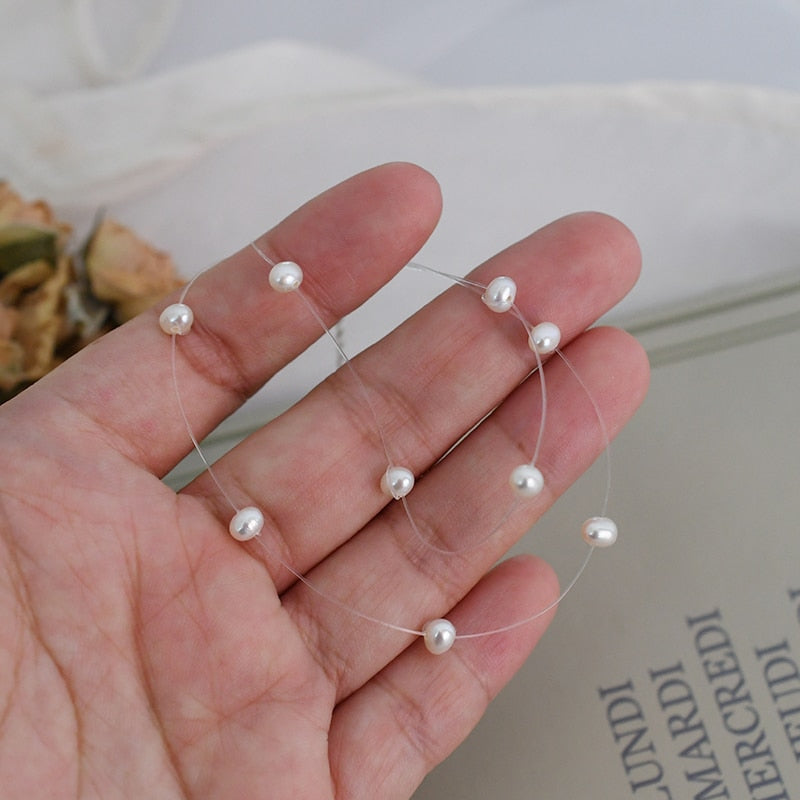 Collier perle fil transparent