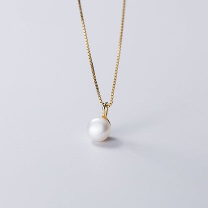 Collier pendentif perle